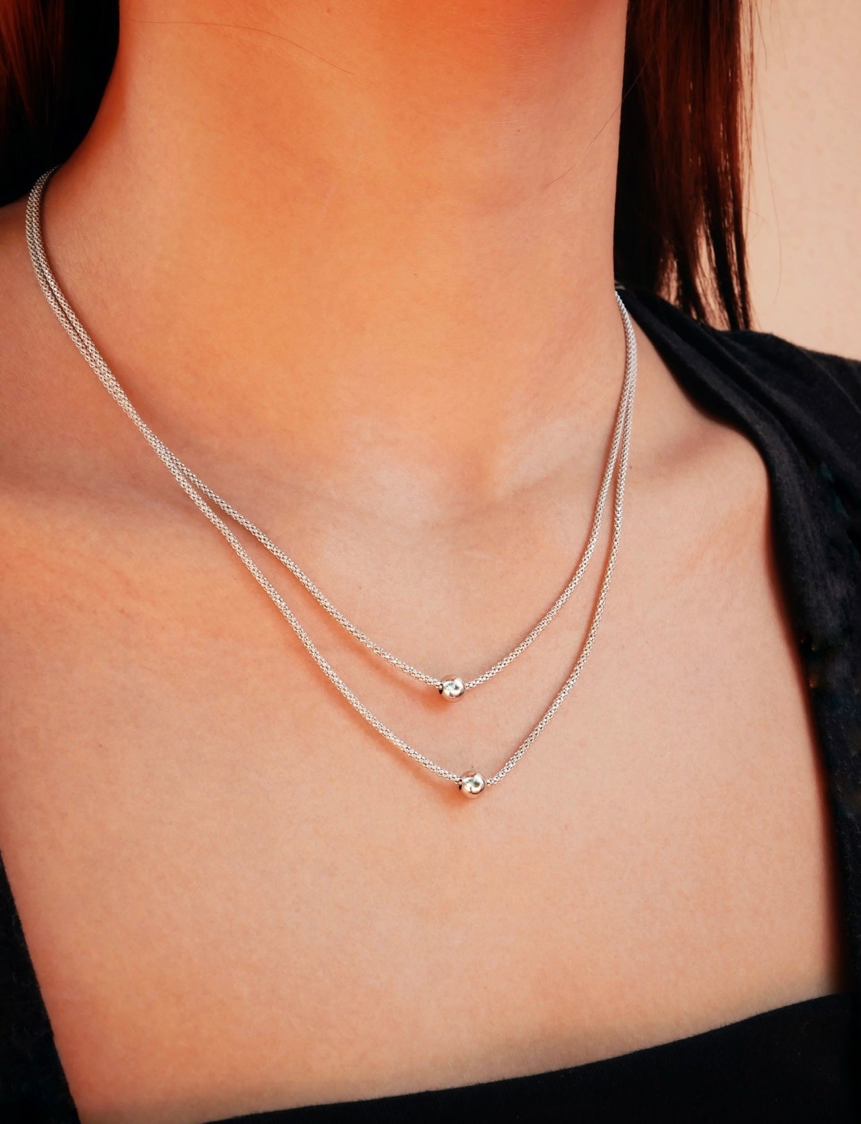 Collana in argento con pianeti