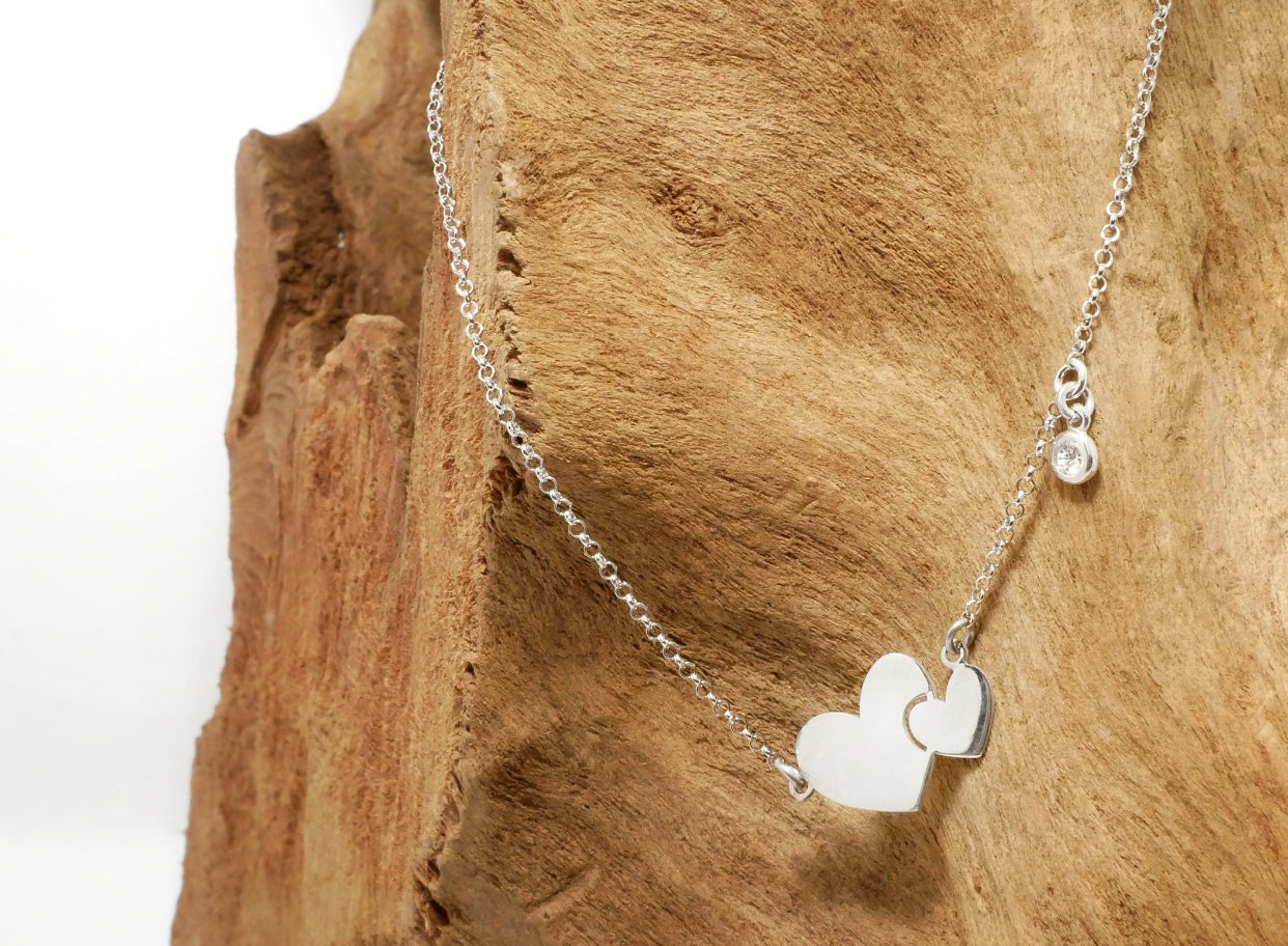 Collana in argento con cuore e zircone brillante